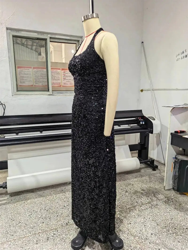 Black sequin halter bodycon gown back view on mannequin, 3D floral sparkle