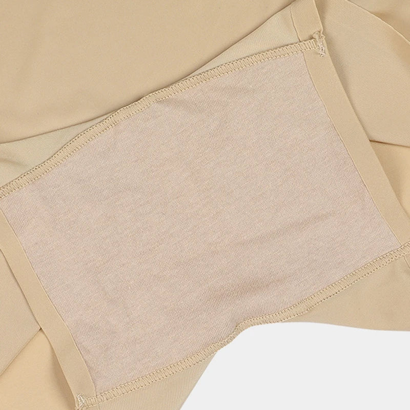 Nude ice silk fitness panties close-up of smooth panel and stitched leg opening