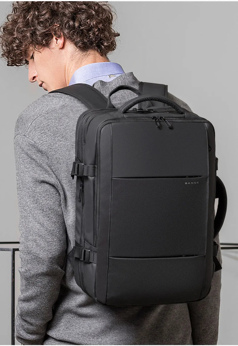 Men’s waterproof backpack with padded back and front organizer panel, front view