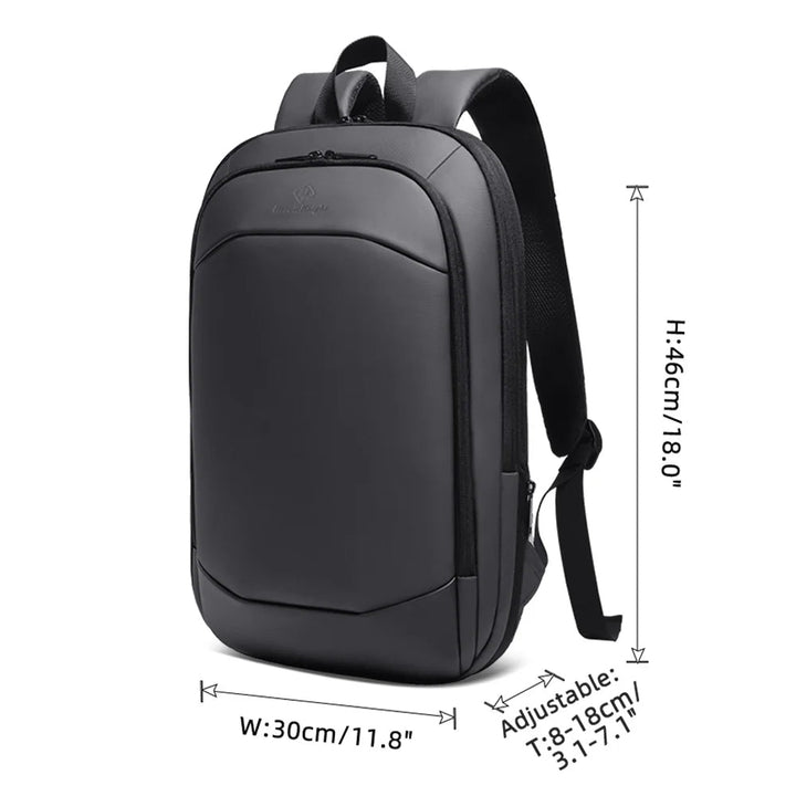 Black slim travel backpack with top handle and adjustable shoulder strap