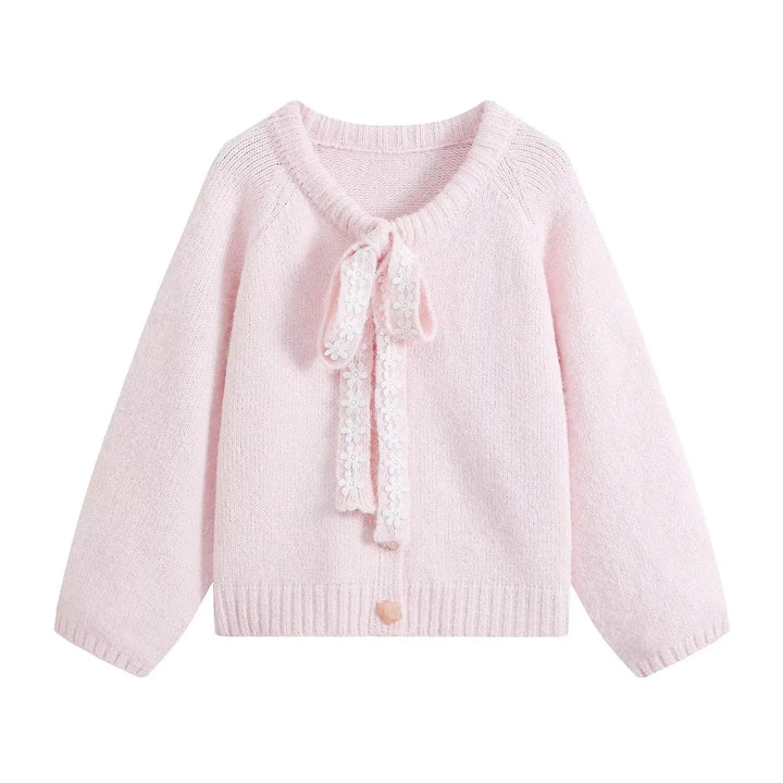 Pink cropped knit cardigan with lace tie front and soft ribbed hem