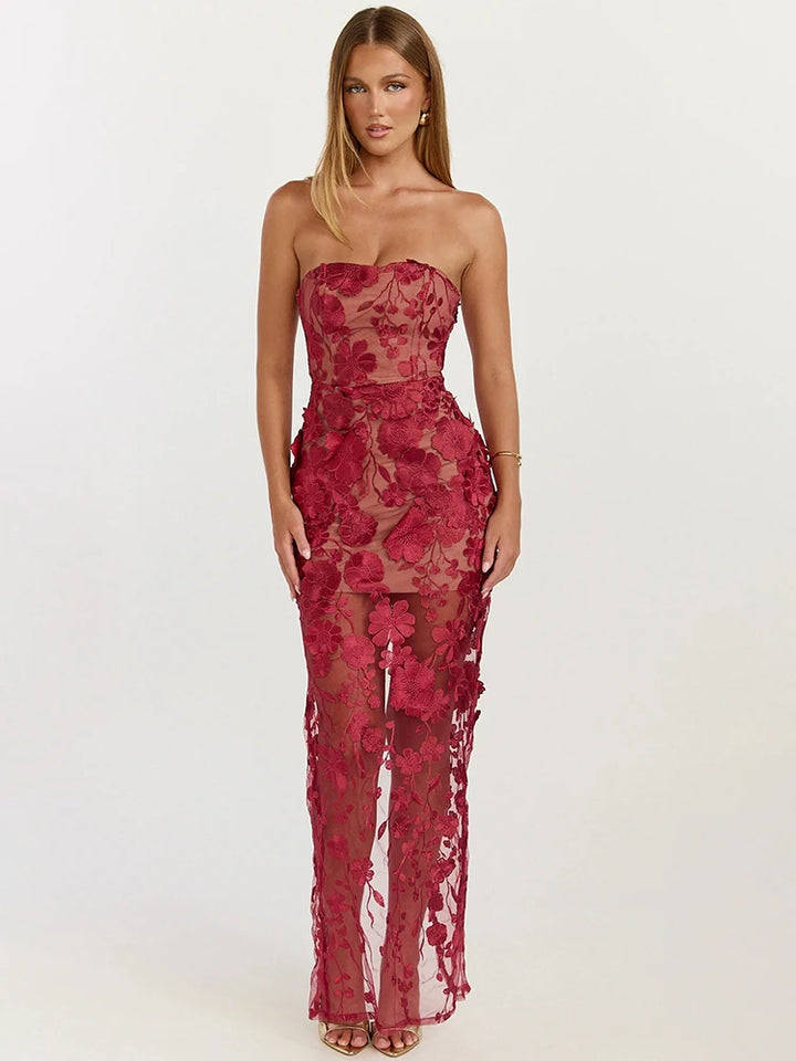Wine red lace strapless party gown with floral pattern, fitted waist, and long sheer hem