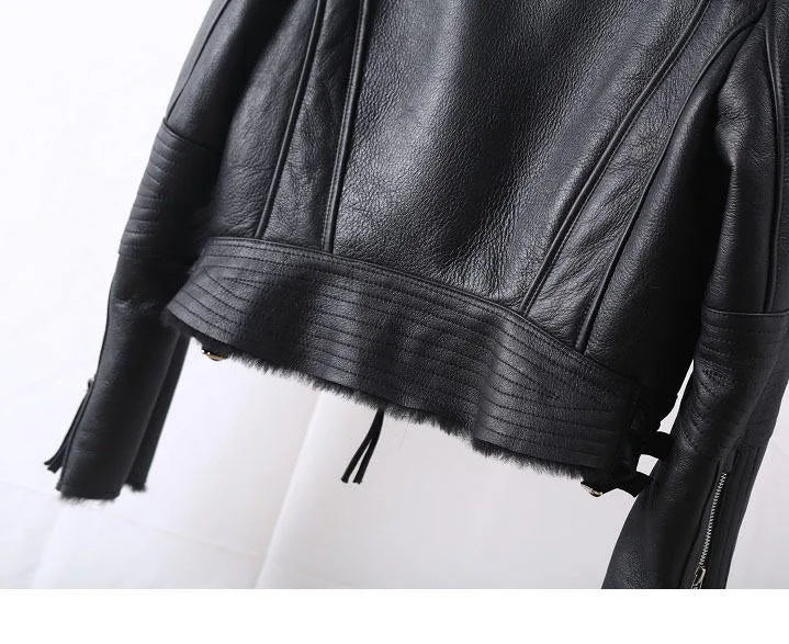 Black cropped leather jacket with faux-fur hem trim and front zipper pulls