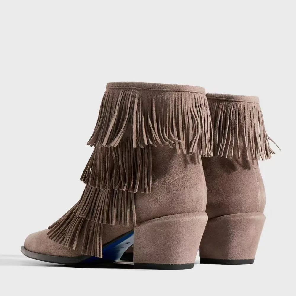 Women's suede tassel boots, taupe, back three-quarter view with fringe detail and low block heel