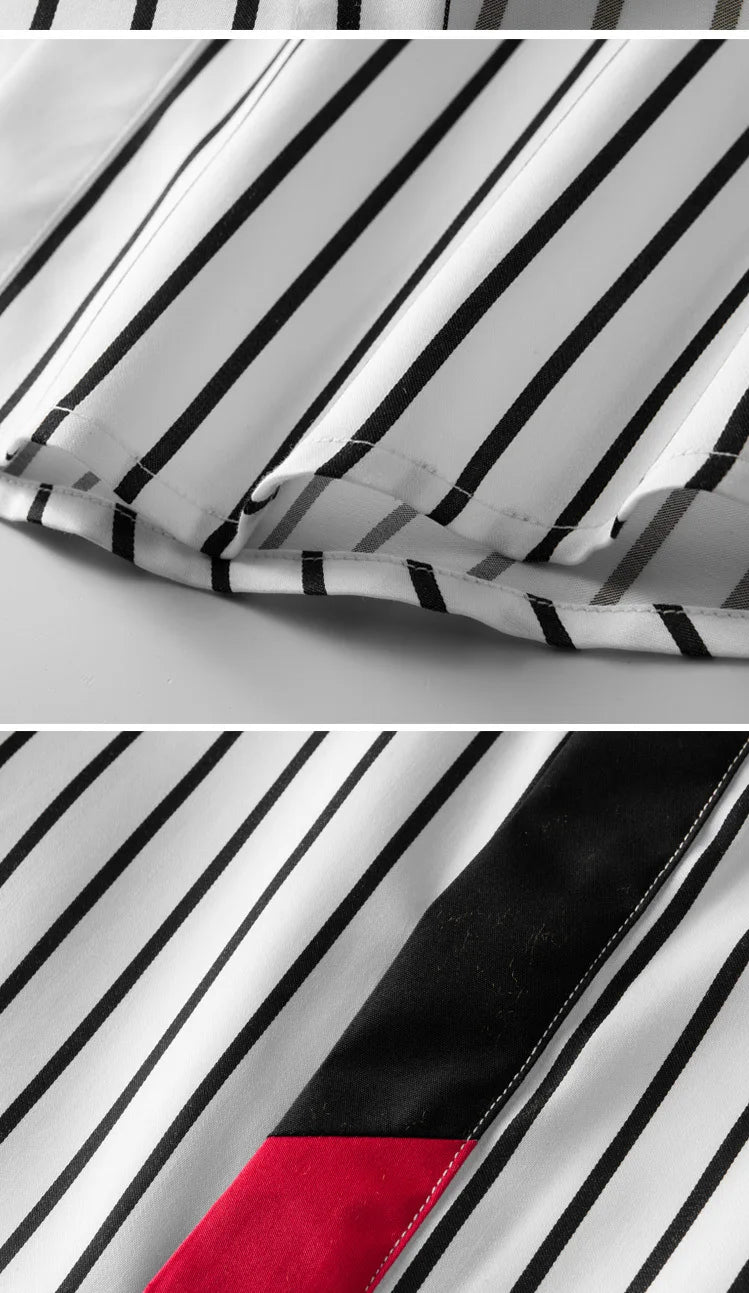 Striped party shirt sleeve and fabric close-up, black-and-white vertical stripes