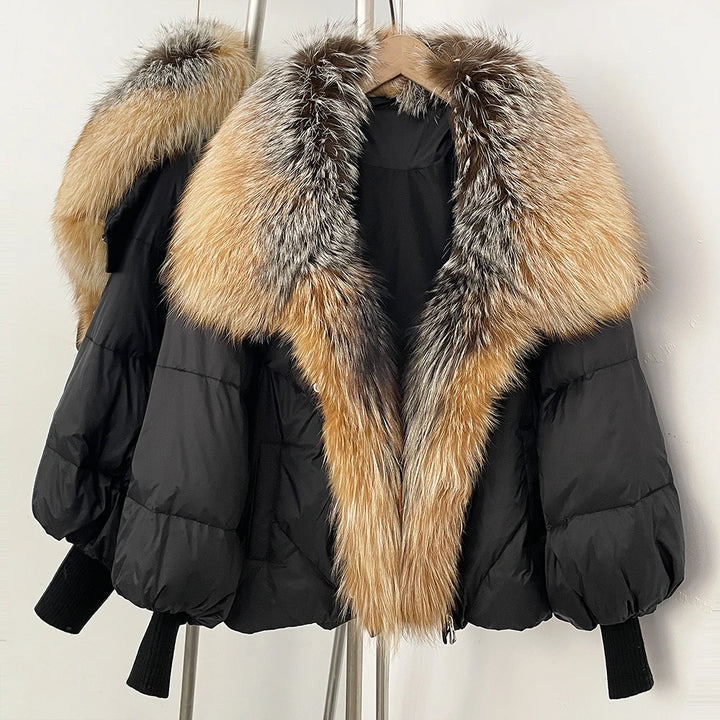 Black puffer coat with multicolor tan-and-gray faux-fur hood and trim