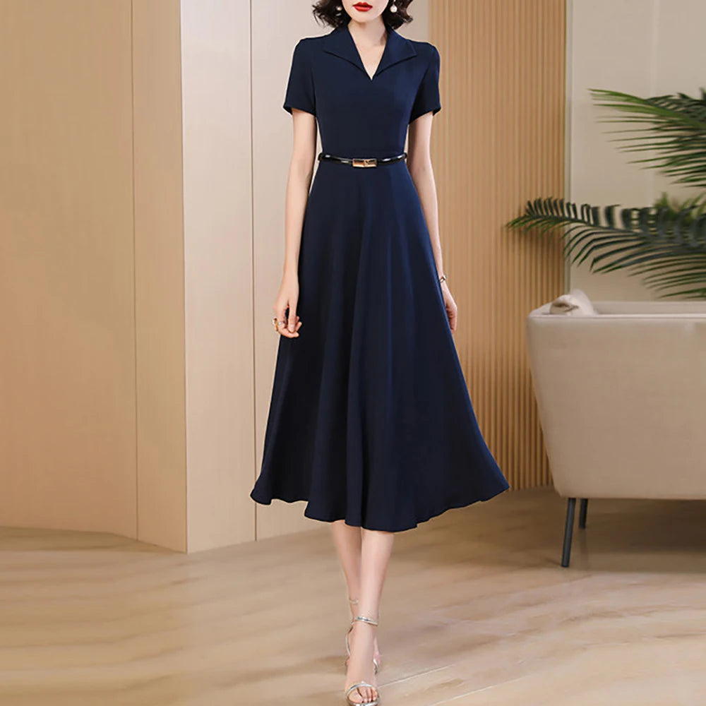 Navy mid-calf A-line dress with V-neck, short sleeves, and black waist belt