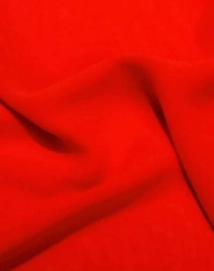 Chiffon midi party gown fabric swatch in red, soft draped close-up