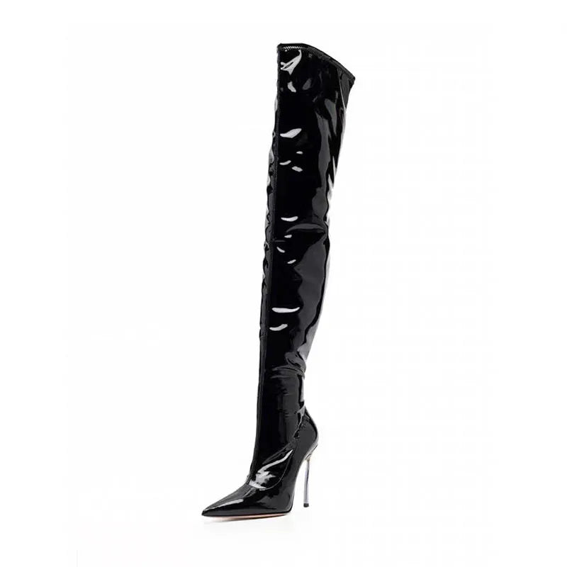 Black shiny patent leather tall heeled boots with pointed toe and stiletto heel.