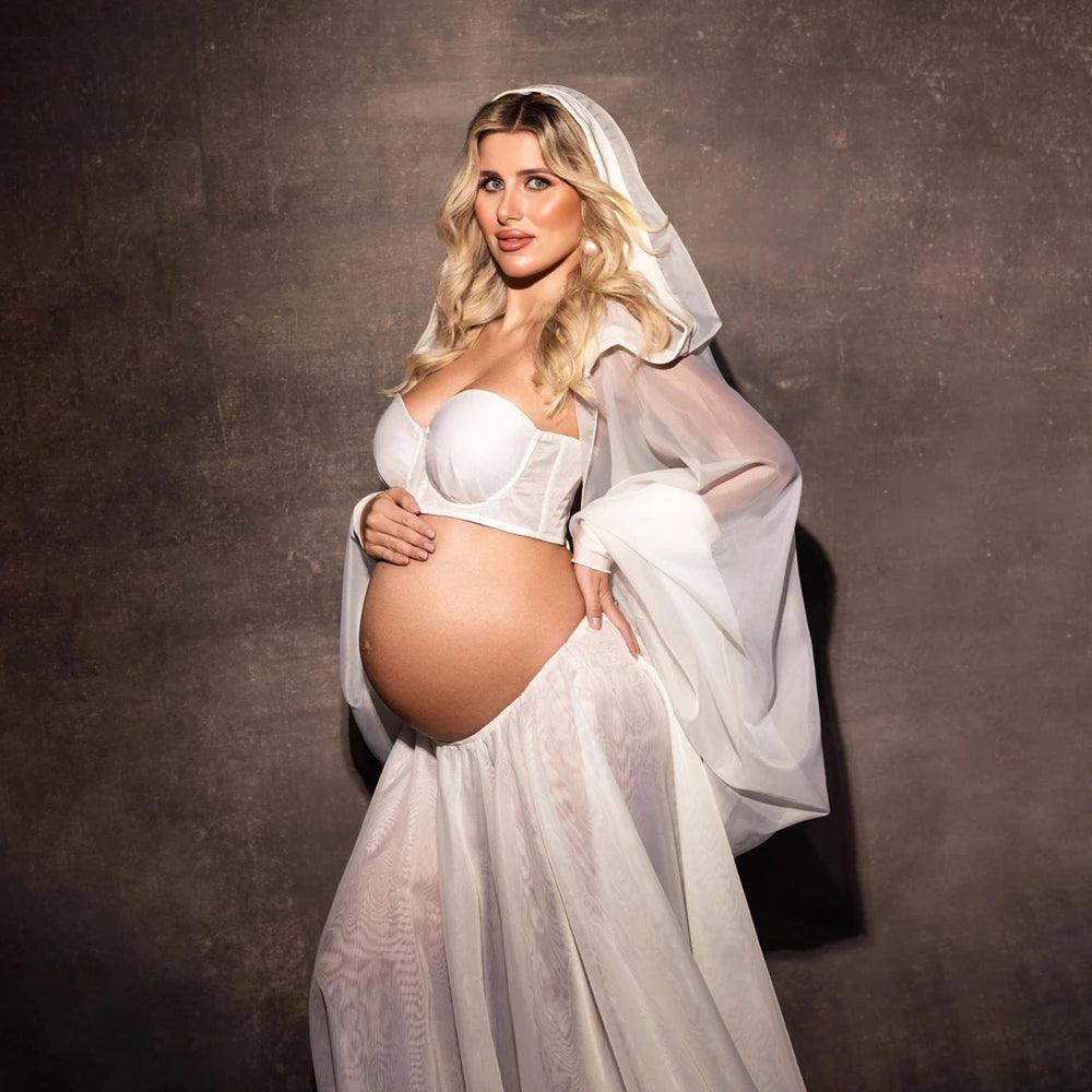 Women’s white maternity robe dress with off-shoulder bodice and draped sleeves