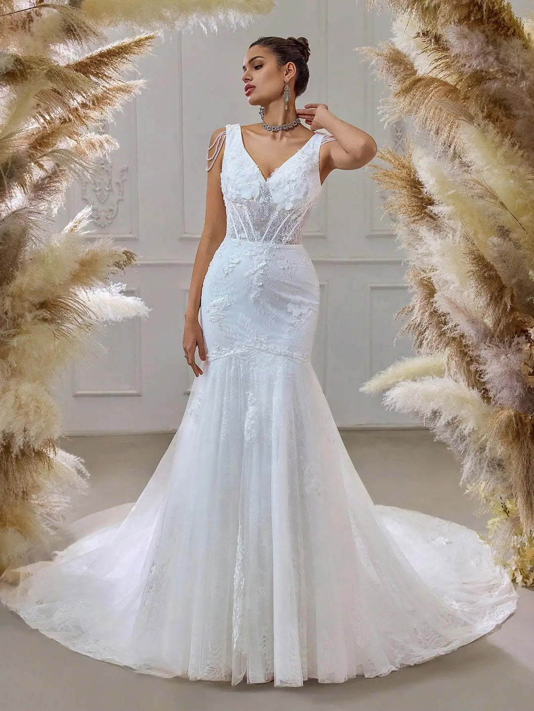 White beaded bridal mesh mermaid gown with sheer illusion neckline and fitted waist
