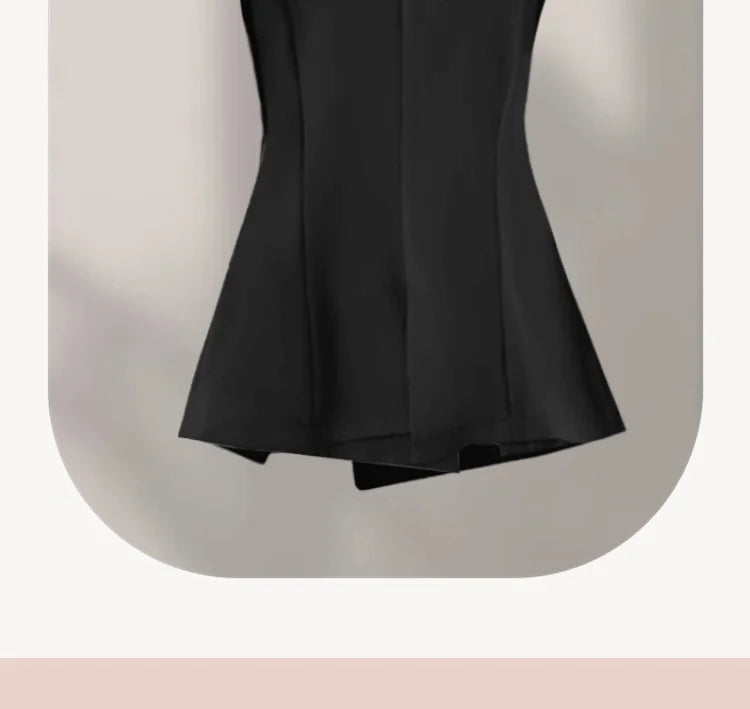 Black sleeveless blazer vest back view with center seam and flared hem