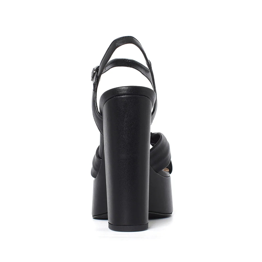 Black platform heel sandal with T-strap and buckle detail, chunky block heel
