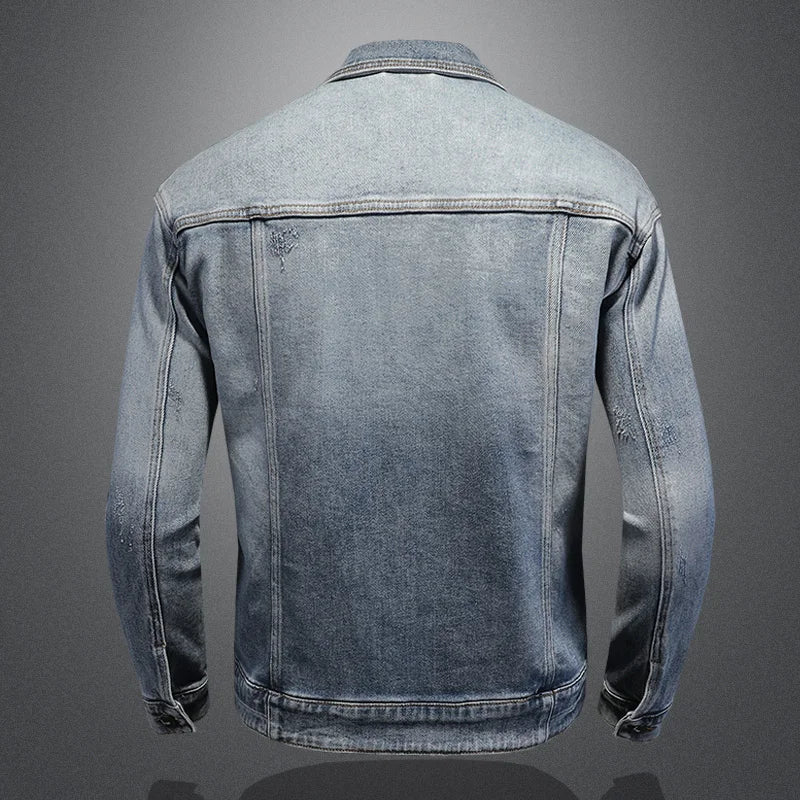 Back view of light blue denim jacket with stand collar and buttoned placket