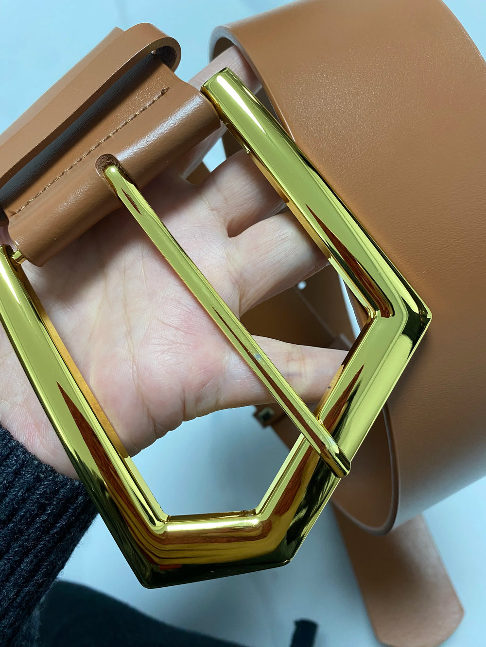 Brown leather corset waist belt with large gold-tone geometric buckle frame
