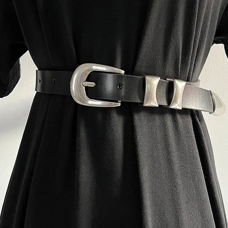 Black narrow leather corset belt with silver buckle and grommet holes