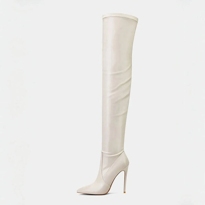 Cream faux-suede knee-high heeled slip-on boots, side view