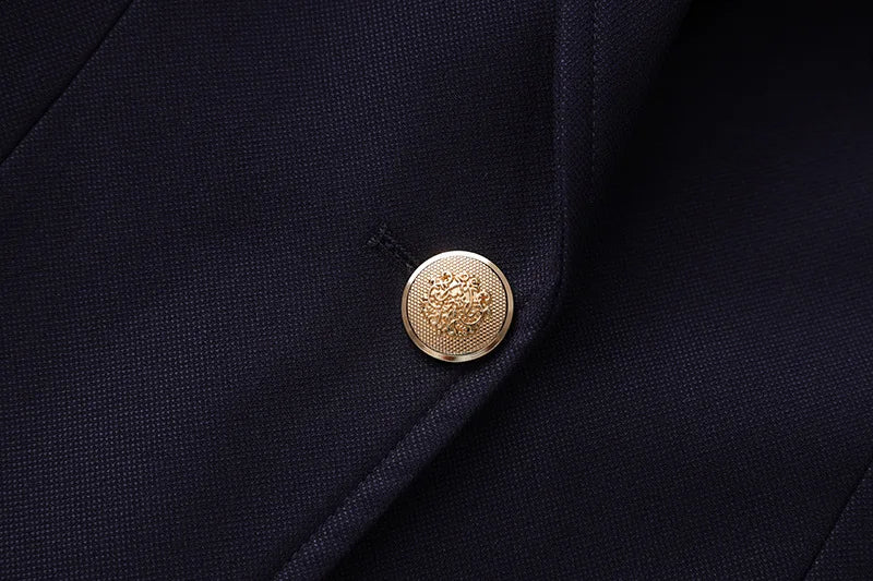 Navy blazer front with round gold button at notched lapel