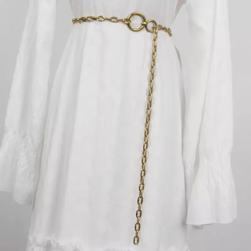 Gold metal chain waist belt with circular ring clasp and long dangling chain