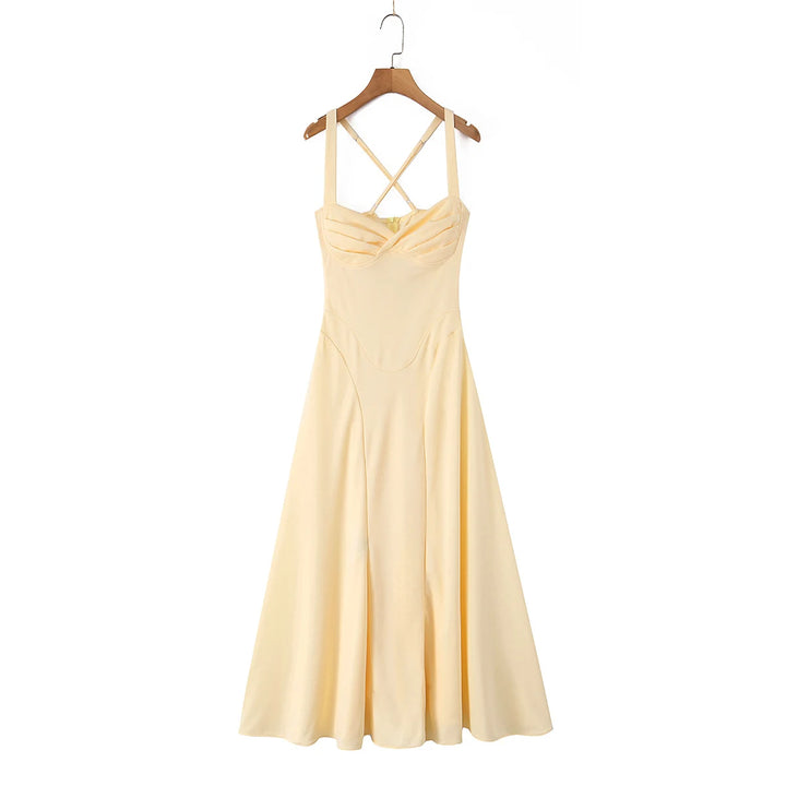 Yellow lace-up ruched midi dress on hanger with crisscross back straps and flared skirt