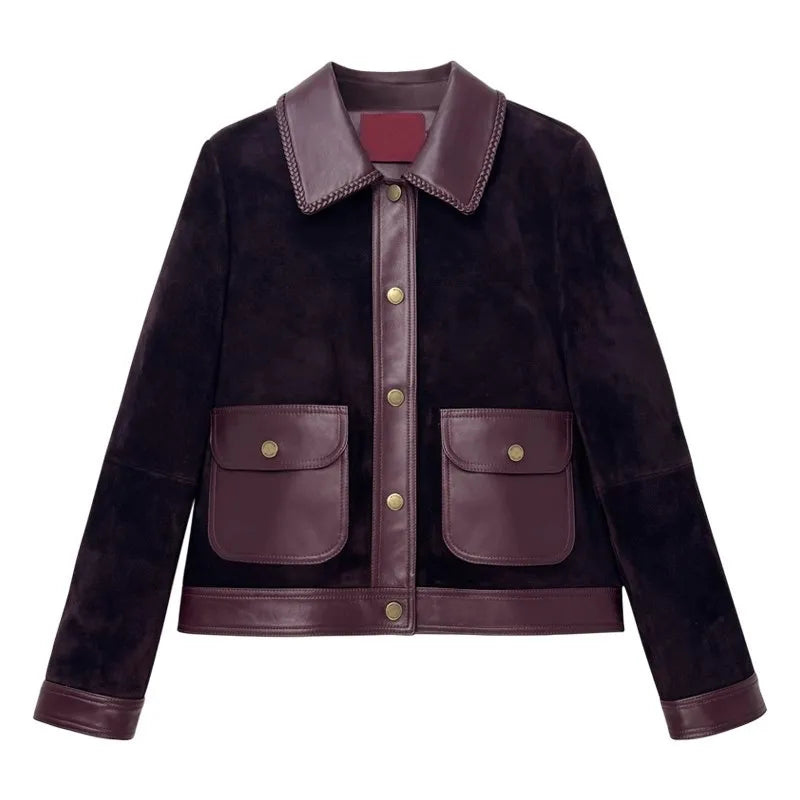 Dark purple suede lapel jacket front with snap placket and two patch pockets.
