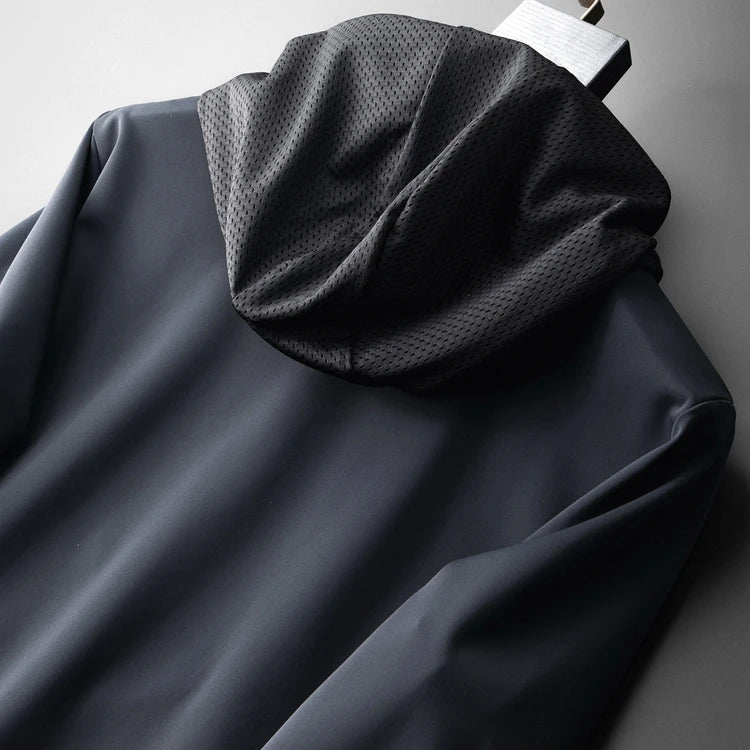 Navy hoodie with textured hood lining and drawstring pull tab