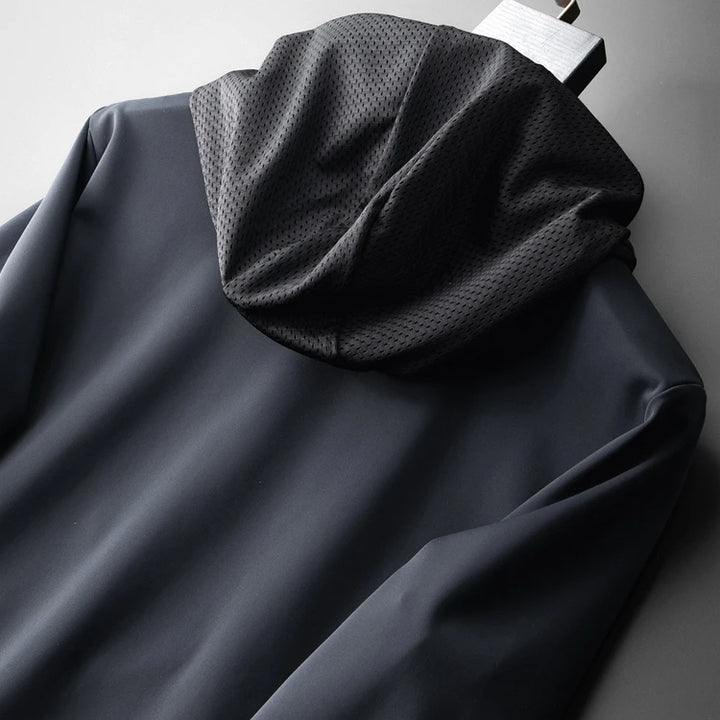 Navy hoodie with textured hood lining and drawstring pull tab