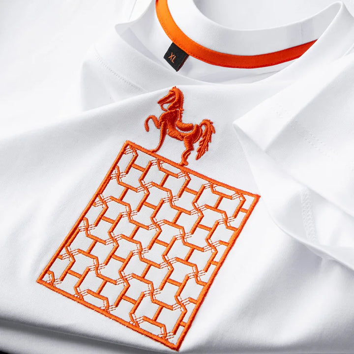 White men’s round-neck tee with large orange horse and geometric embroidery on chest