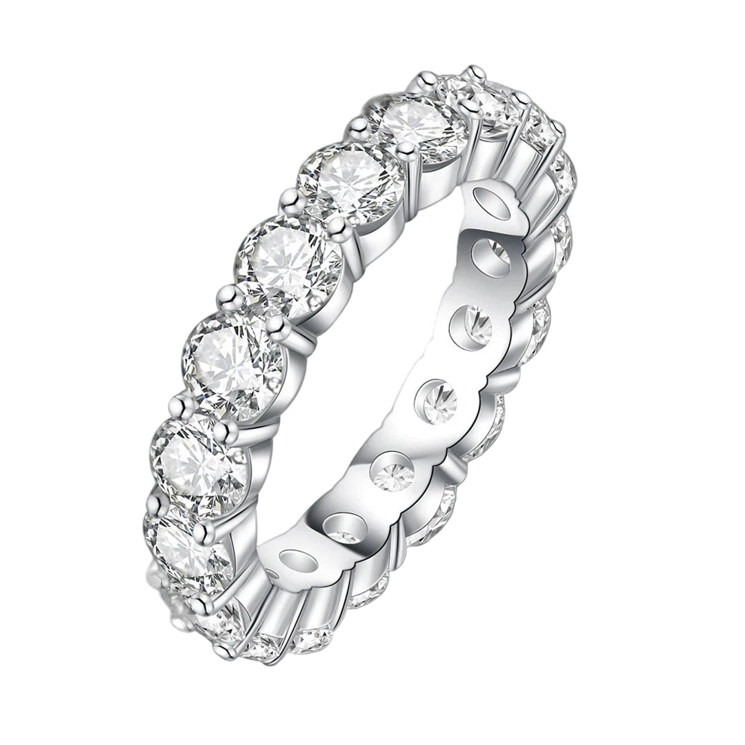 Silver ring with diamonds on a black background