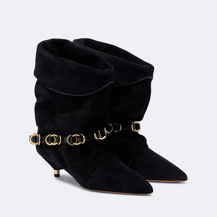 Black suede mid-calf heeled boots with draped cuff and gold-tone chain belt