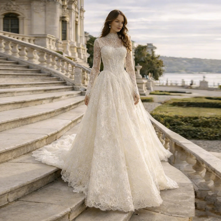 High-neck lace bridal gown with long sleeves and full A-line skirt