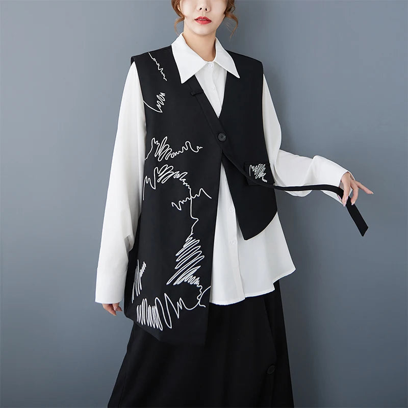 Black sleeveless V-neck waistcoat with white script embroidery and button-front design.