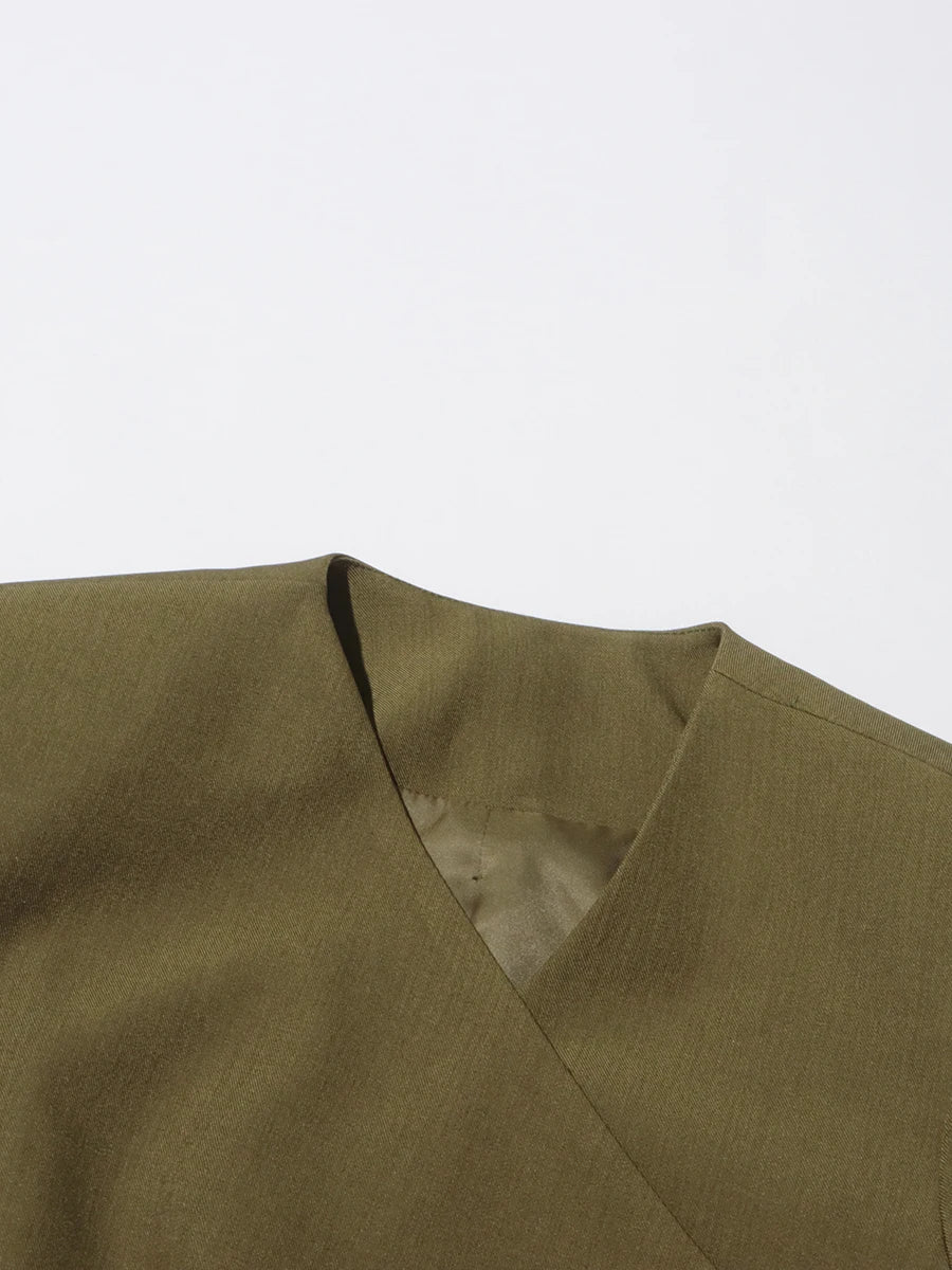 Olive-green asymmetrical blazer neckline and inner lining view