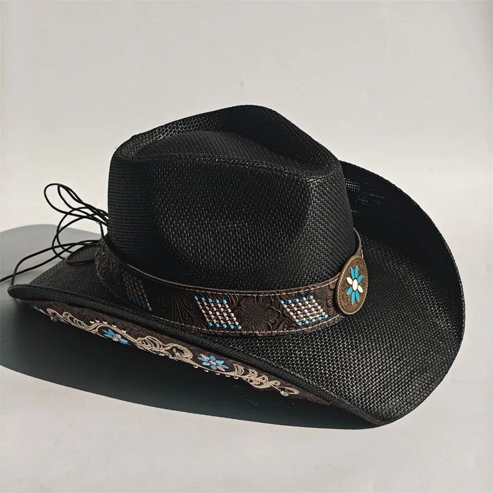 Black cowboy hat with turquoise bead-like embroidery and small flower badge