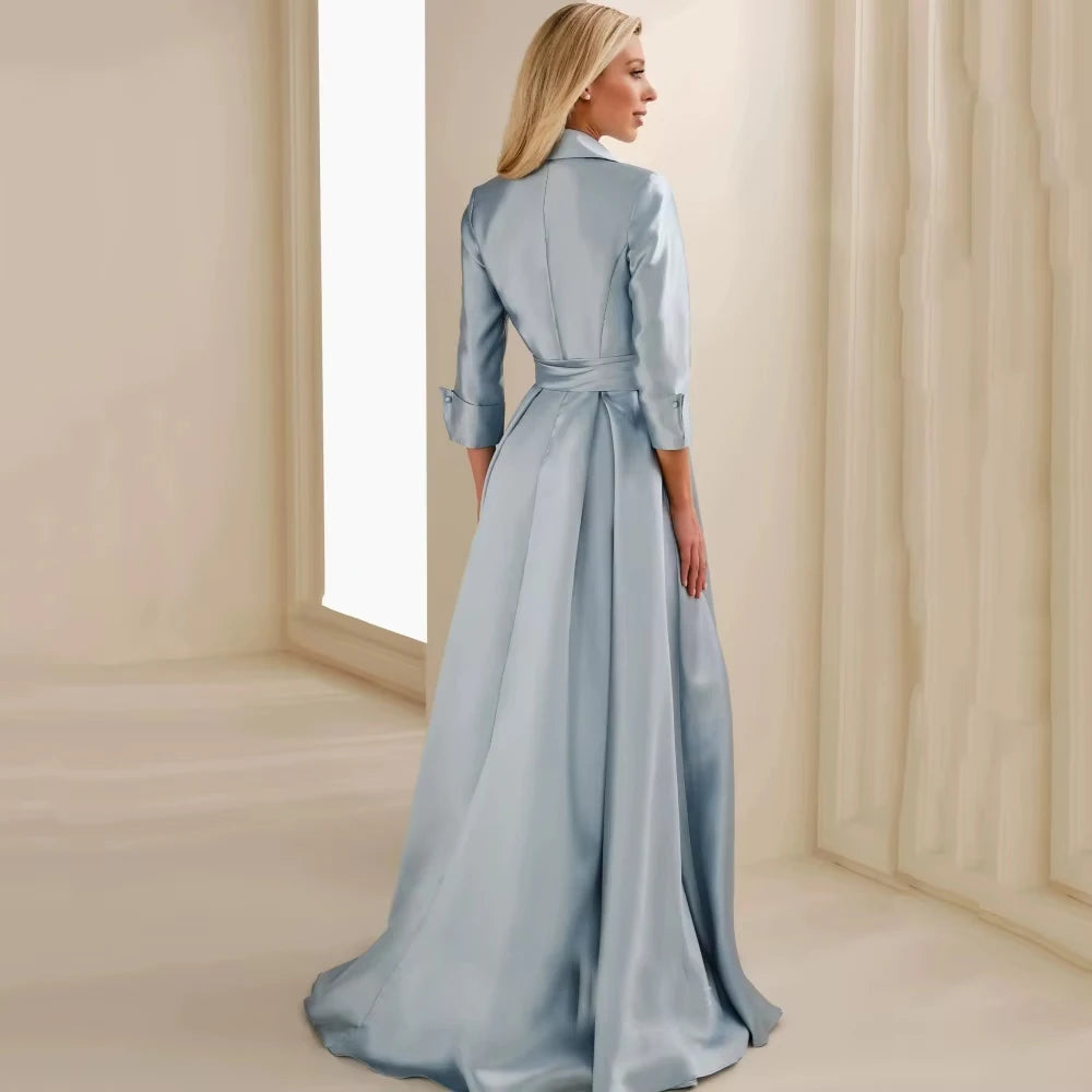 Women's chiffon bride gown rear view, tied waist with flowing A-line skirt, light blue