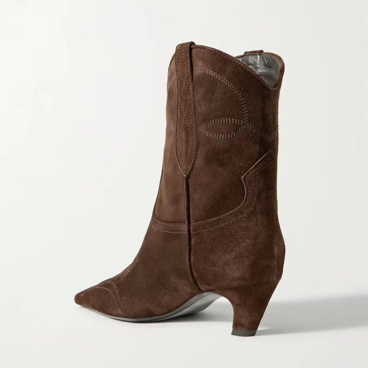 Brown faux suede cowboy boots with embroidered swirl stitching and low block heel