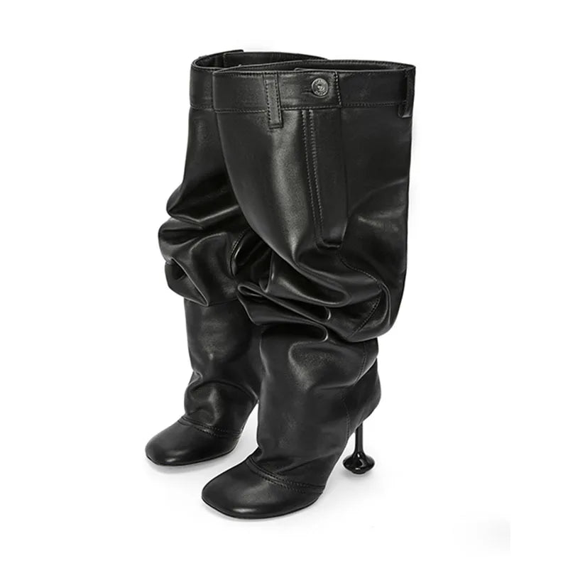 Black thigh-high boots with round toe, ruched shaft, and buckle strap