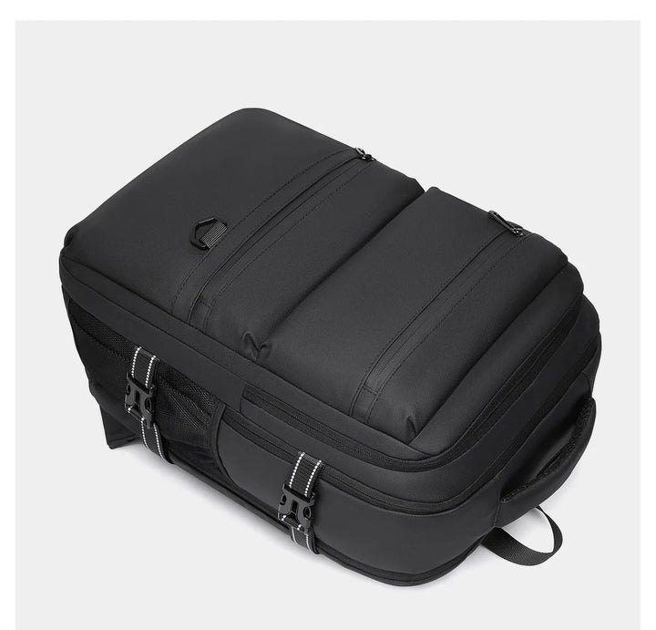 Black travel laptop backpack top view with side carry handle and front closures