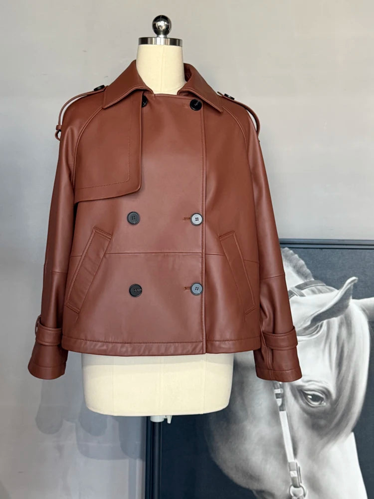Women’s short leather coat front view with wide lapel and button closures, caramel-brown