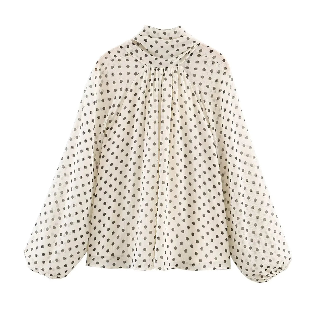 Cream polka-dot high-neck chiffon blouse with gathered front pleats and long puff sleeves