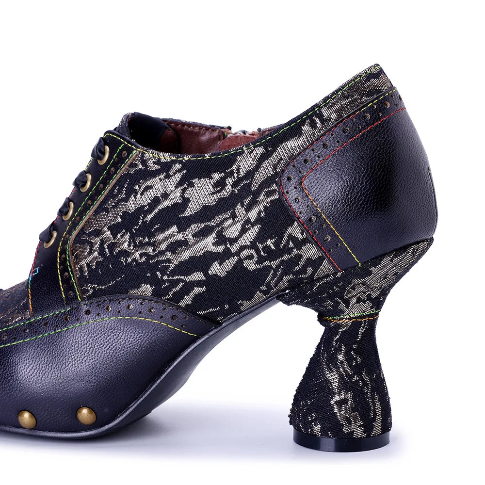 Side view of dark printed leather lace-up heel pump with rivet-studded platform and block heel