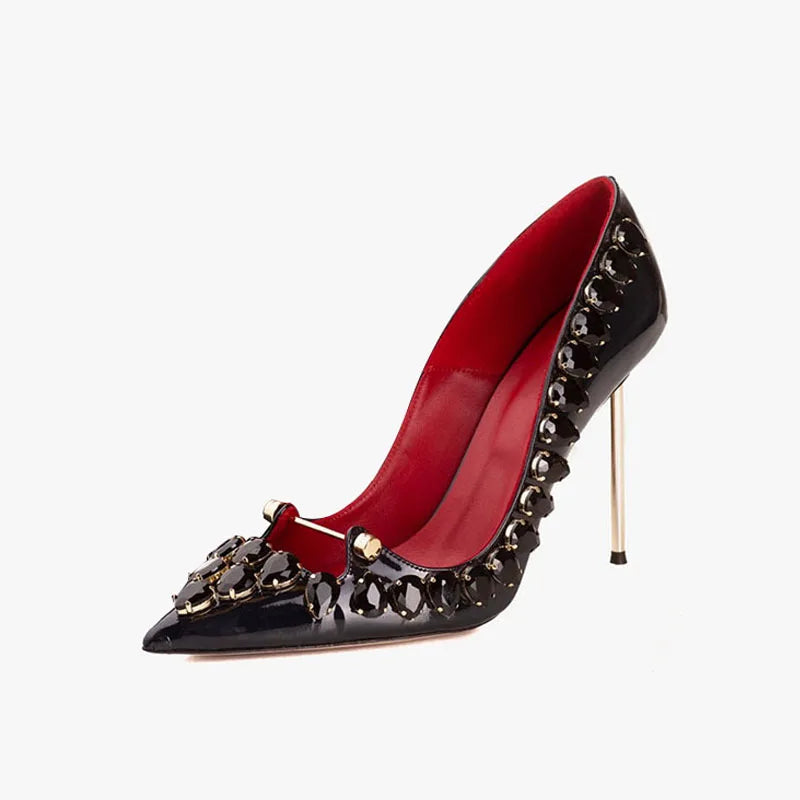 Black pointed-toe crystal heel pumps with high stiletto and red inner lining