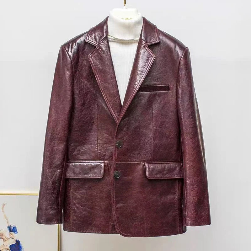 Women’s burgundy leather blazer-style jacket, button front, flap pockets, notch collar