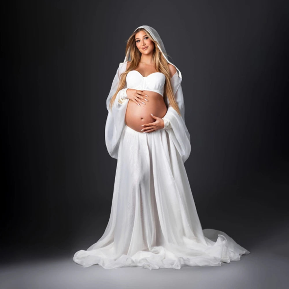 Women’s white maternity robe dress with wide sleeves, veil hood, and full skirt