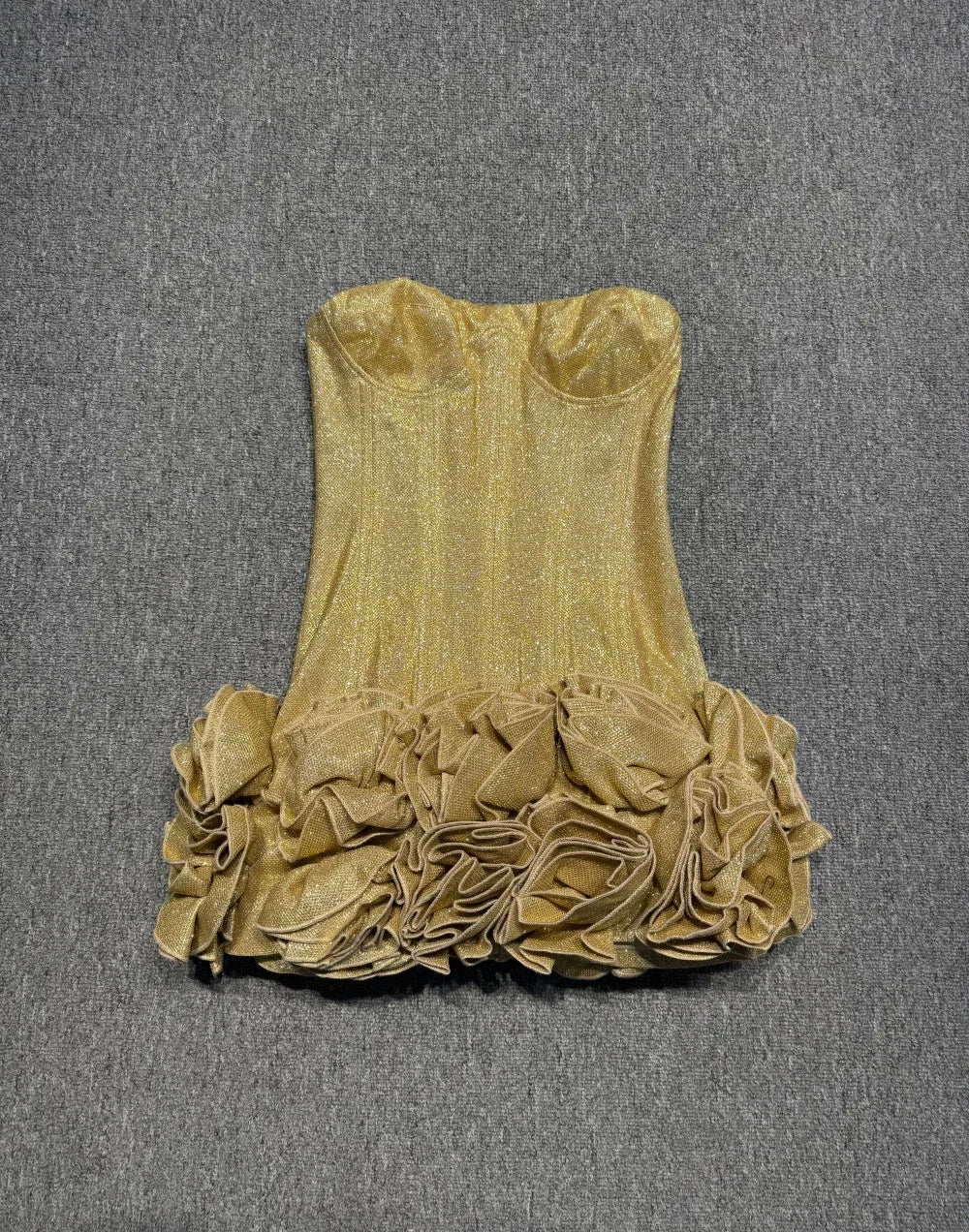 Gold strapless mini dress with ruffled tiered hem and gathered front
