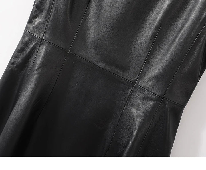 Black leather A-line dress with panel seams and smooth finish