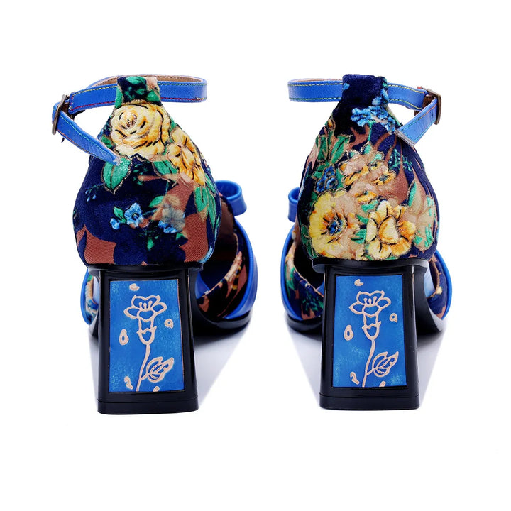 Rear view of blue floral heel sandals with ankle strap and block heel
