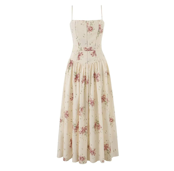 Cream floral print maxi dress with fitted corset-style bodice and pleated skirt