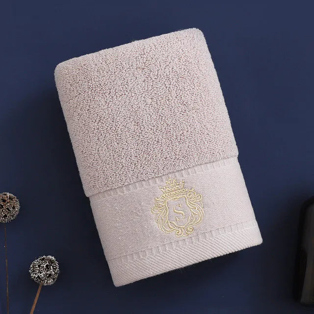 Cotton bath towel, light beige with gold embroidered crest