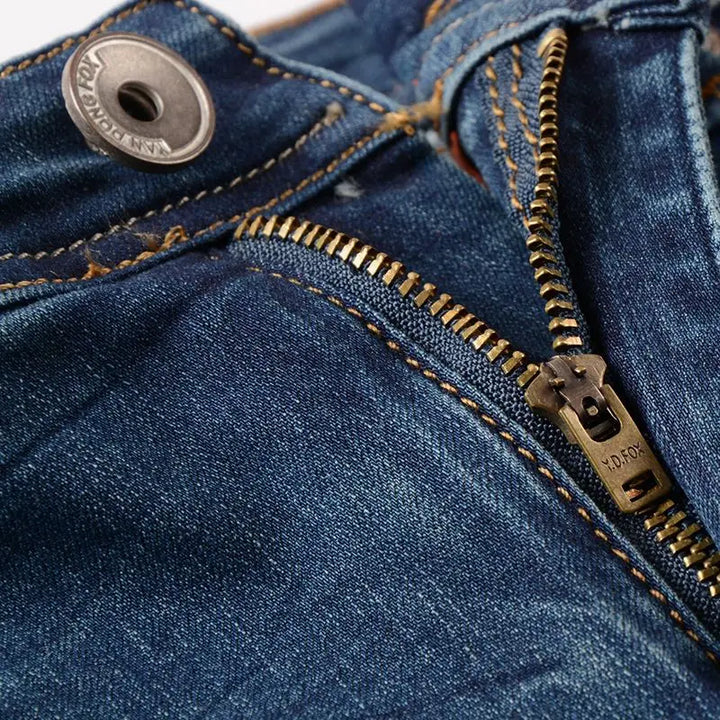 Trendy Elastic Ripped Splicing Denim Pants